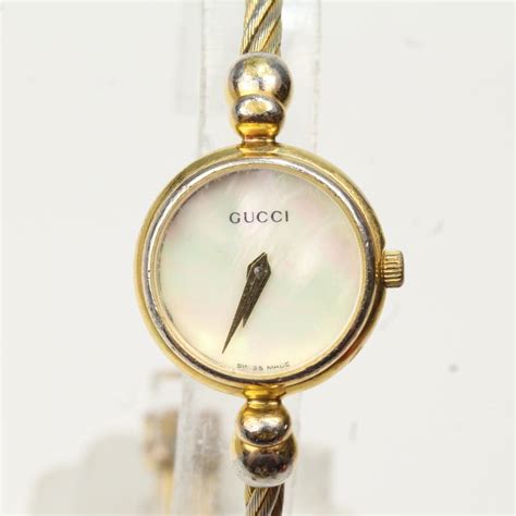 gucci mother of pearl bracelet watch|gucci 147.4.